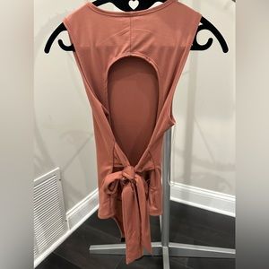 Mauve onsie/body suit size medium. 95% poly/5% spandex.